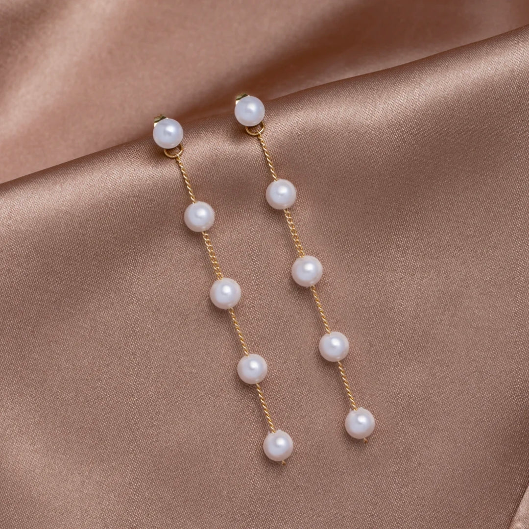 Pearl Dangling  in Gold
