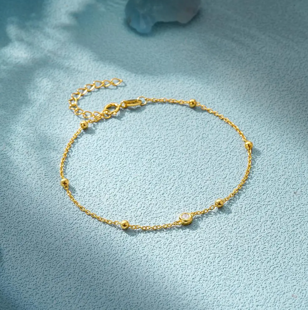 Eye Bracelet with Zirconia Pearls in 18K Gold Plating