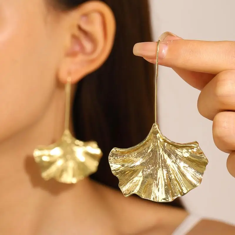 Gold earrings with gray crystal in vintage style